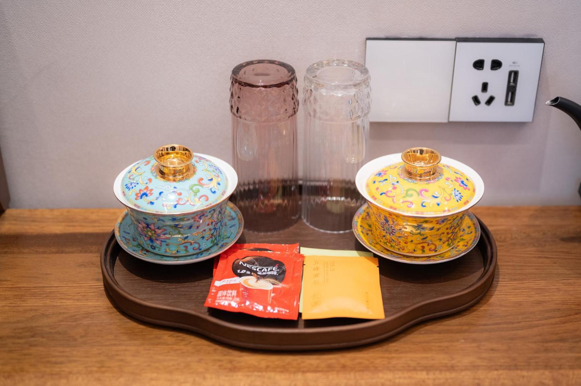 Fuxue Qiuguo Hotel Beijing Nanluoguxiang Siheyuan Branch Rum bild